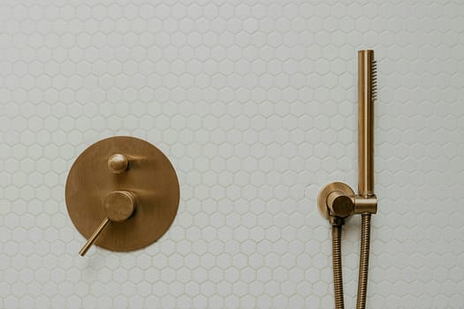 curtis design build bathroom renovations a shower head and shower faucet in a bathroom