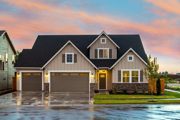 pexels-photo-1396122-1396122 Charming family home in Boise, ID with a modern facade and spacious garage.